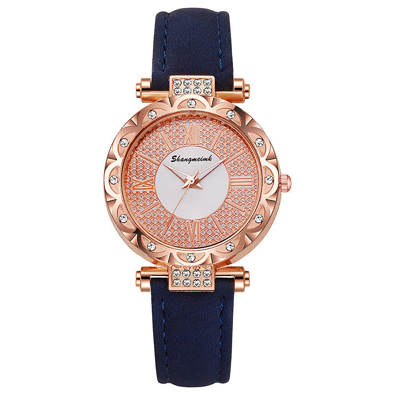 Korean-style quartz watch with a simple leather strap.